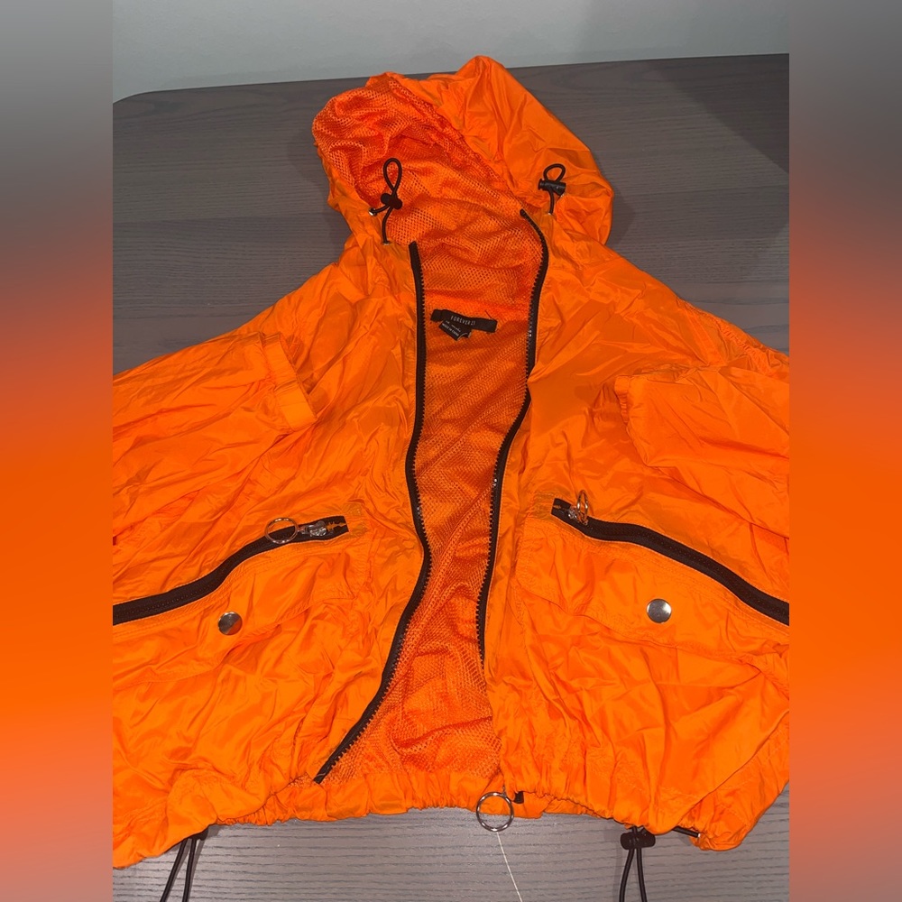 Bright orange trendy waterproof jacket